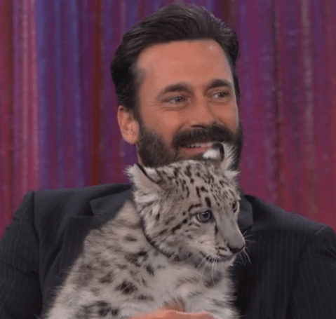 Jon Hamm holding soft fluffy animal